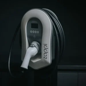 EV charger on black background.